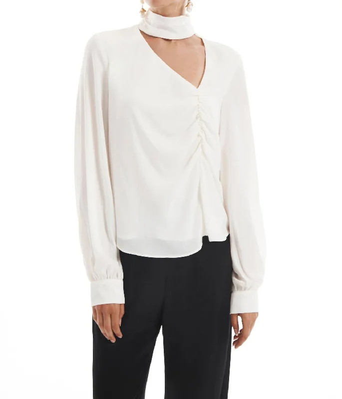 Asymmetrical Keyhole Turtleneck Blouse In Cream